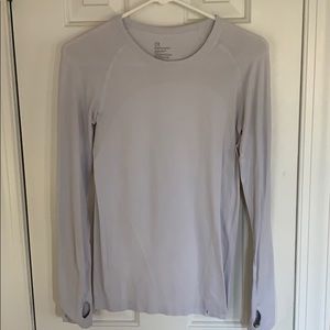 Light gray long sleeve top with thumb loops size S